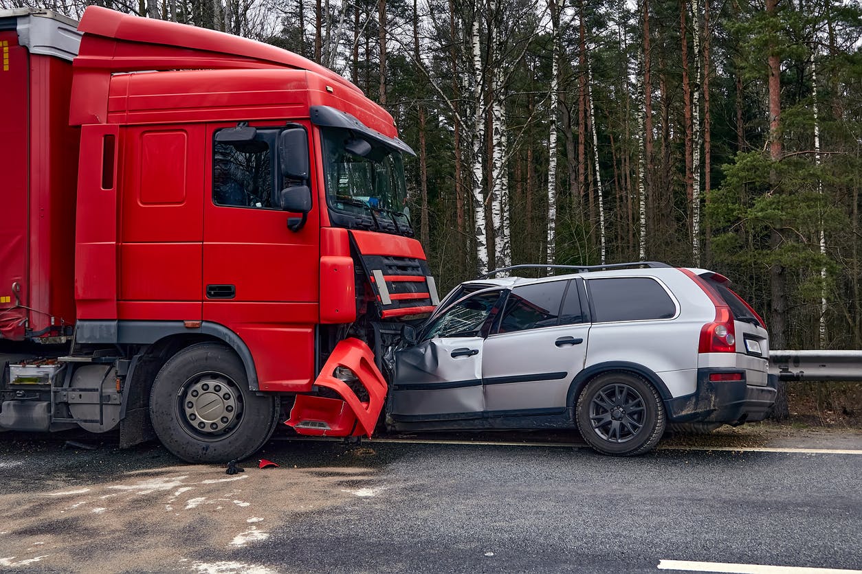 18 wheeler crashing into an SUV