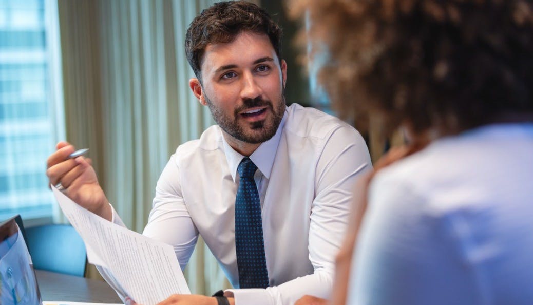 Attorney talking with a client