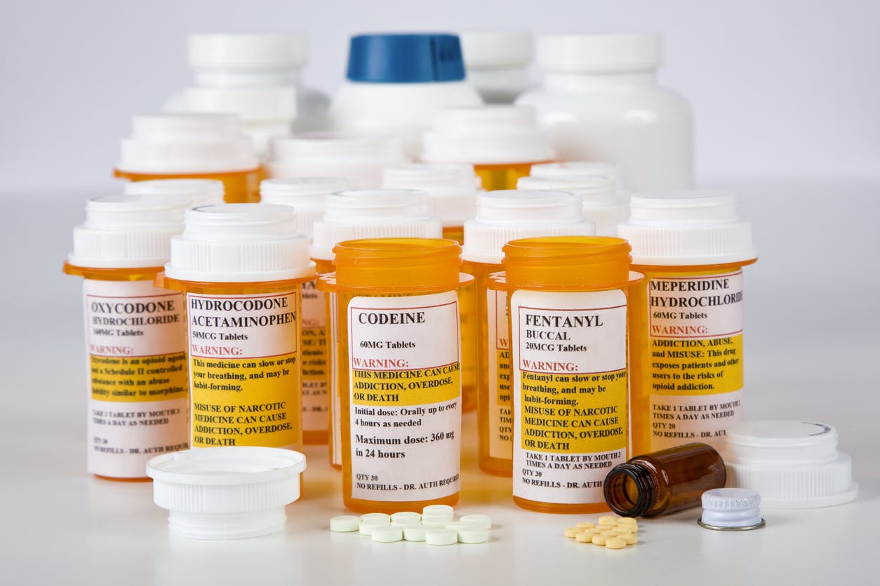 collection of perscription drugs sitting on the counter