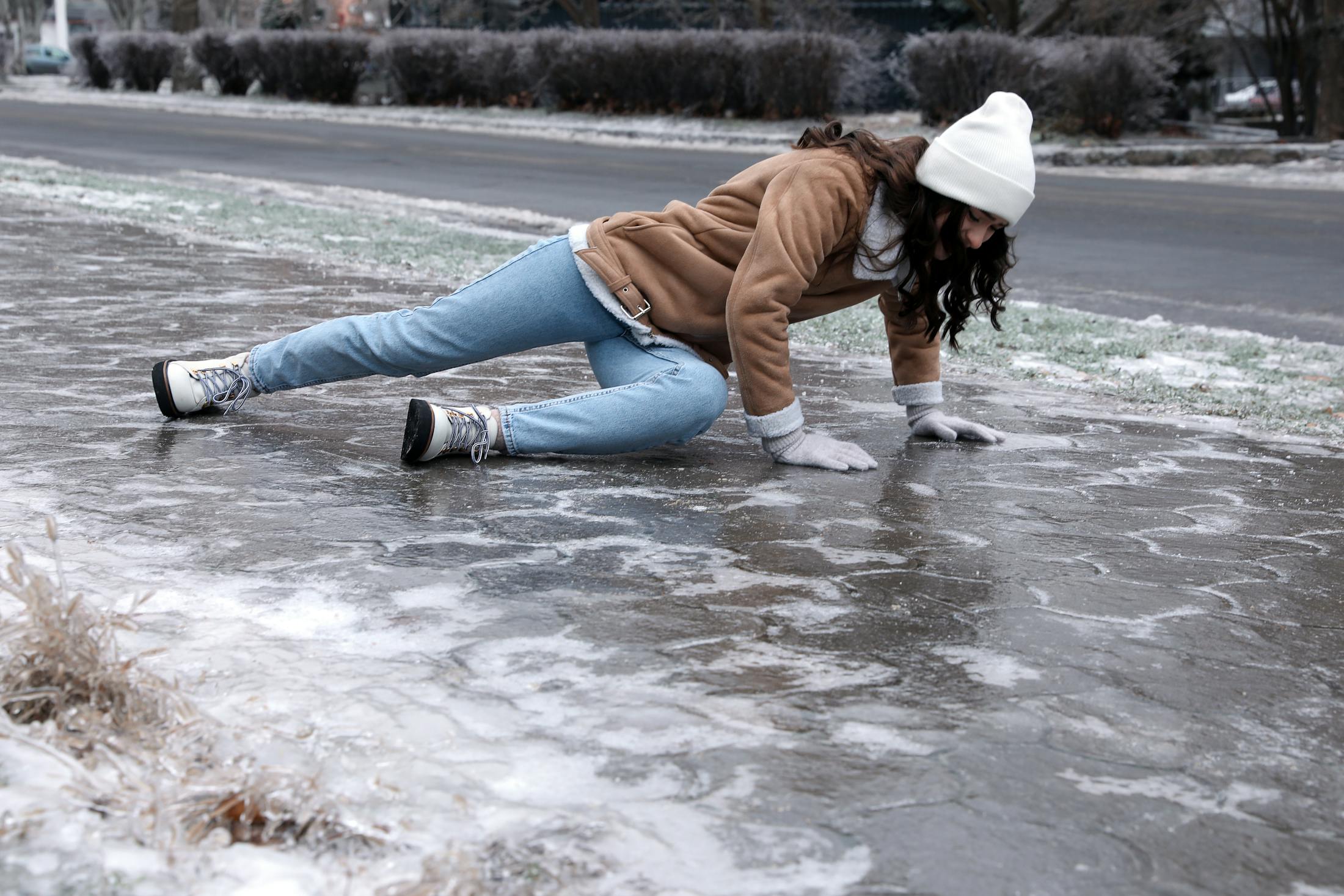 Woman who slipped and fell while walking on ice