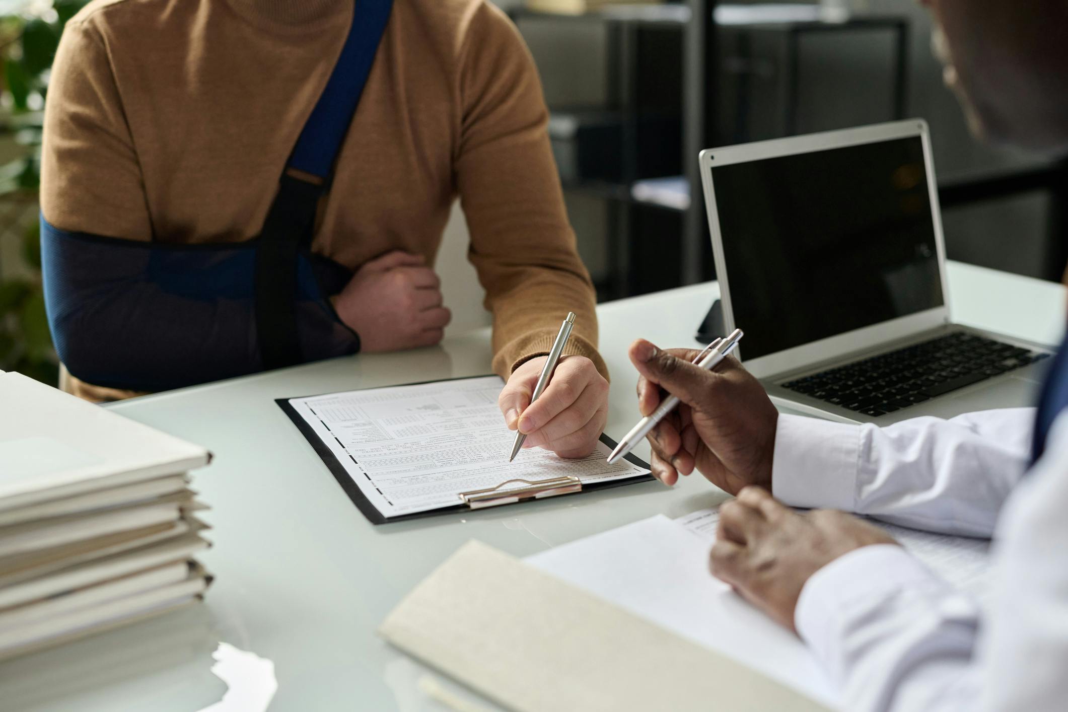 Injured man meeting with lawyer