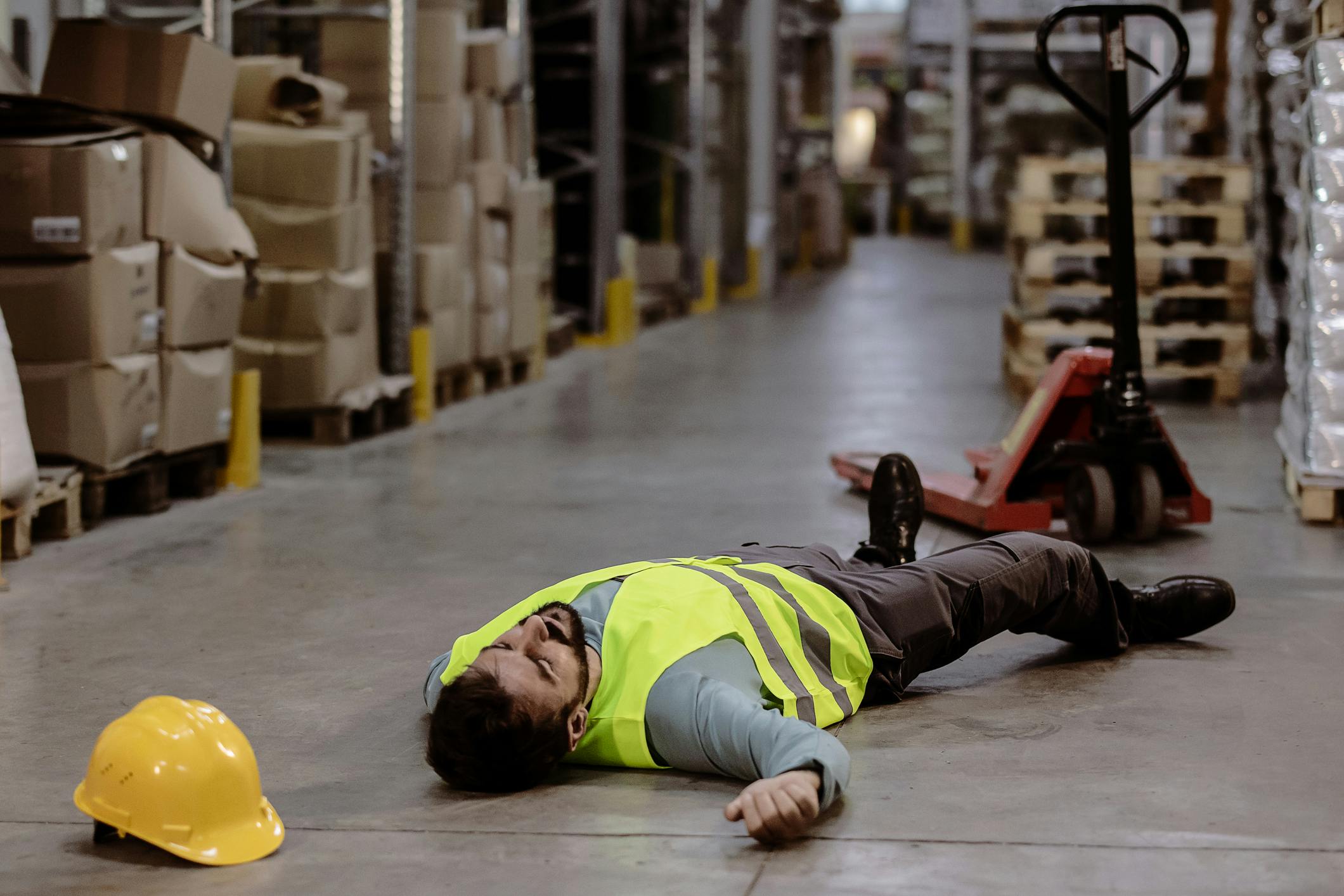 Worker who has fallen on the ground