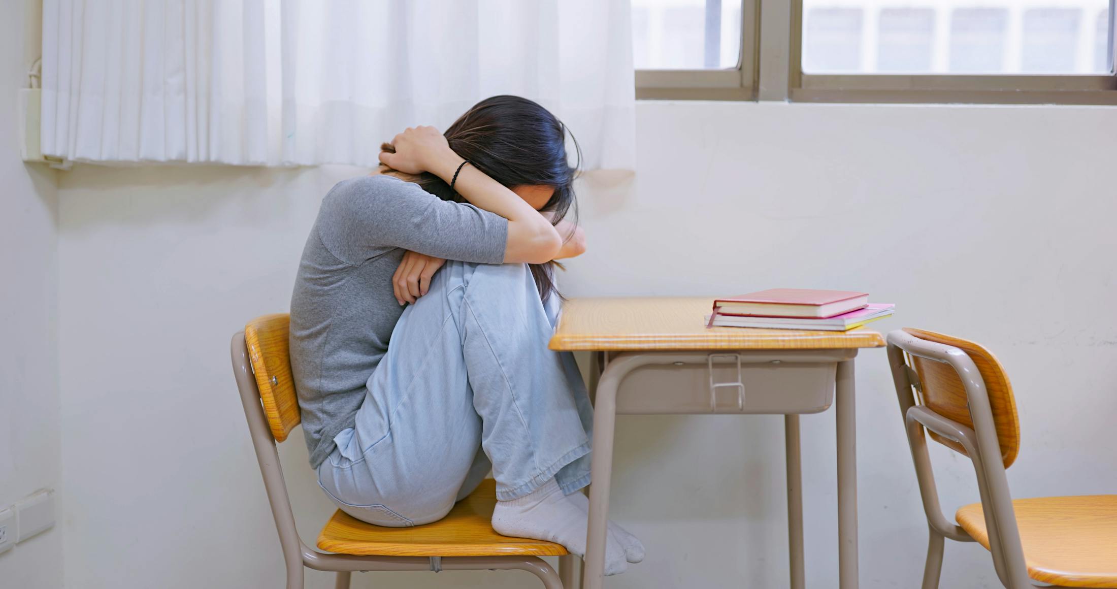 depressed girl in school