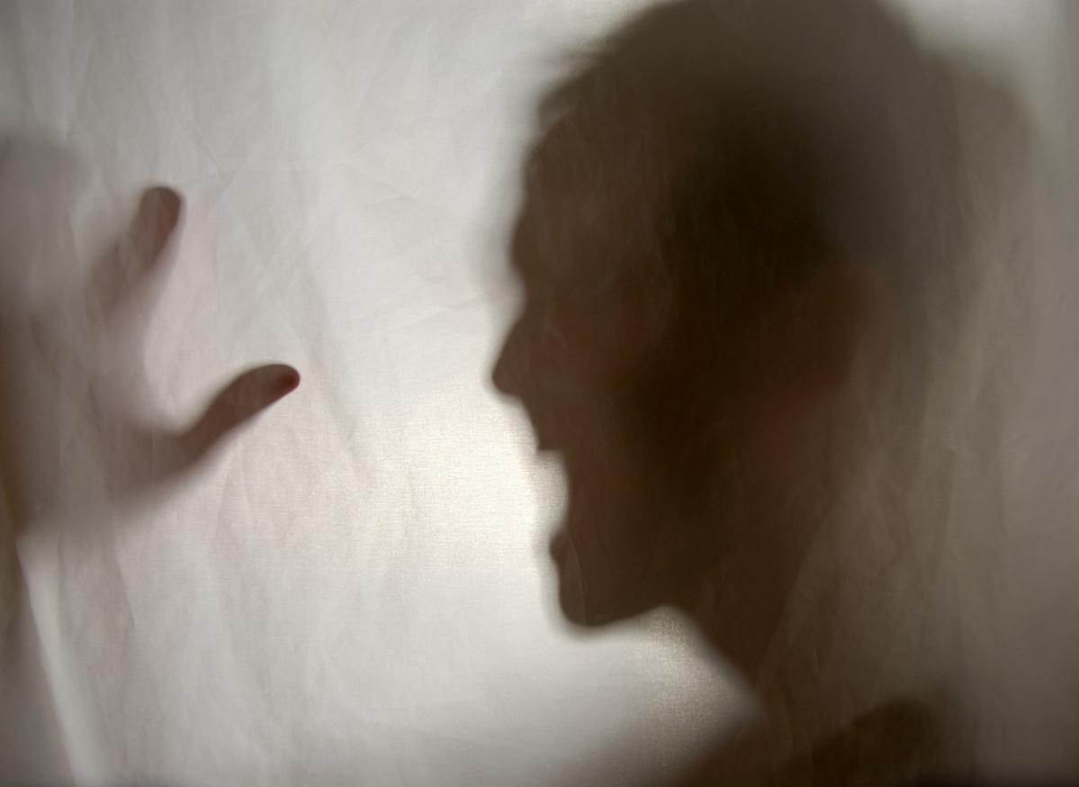 shadow of upset man