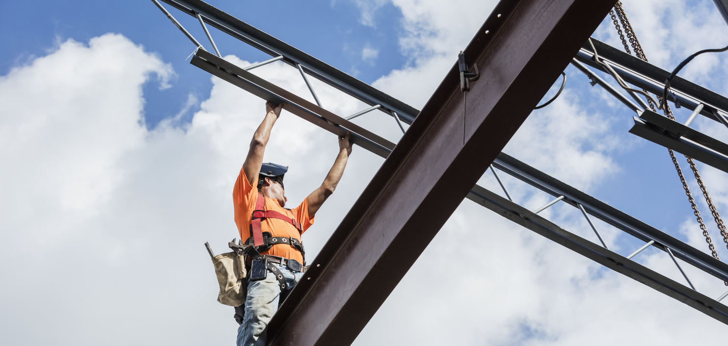 construction worker on beams