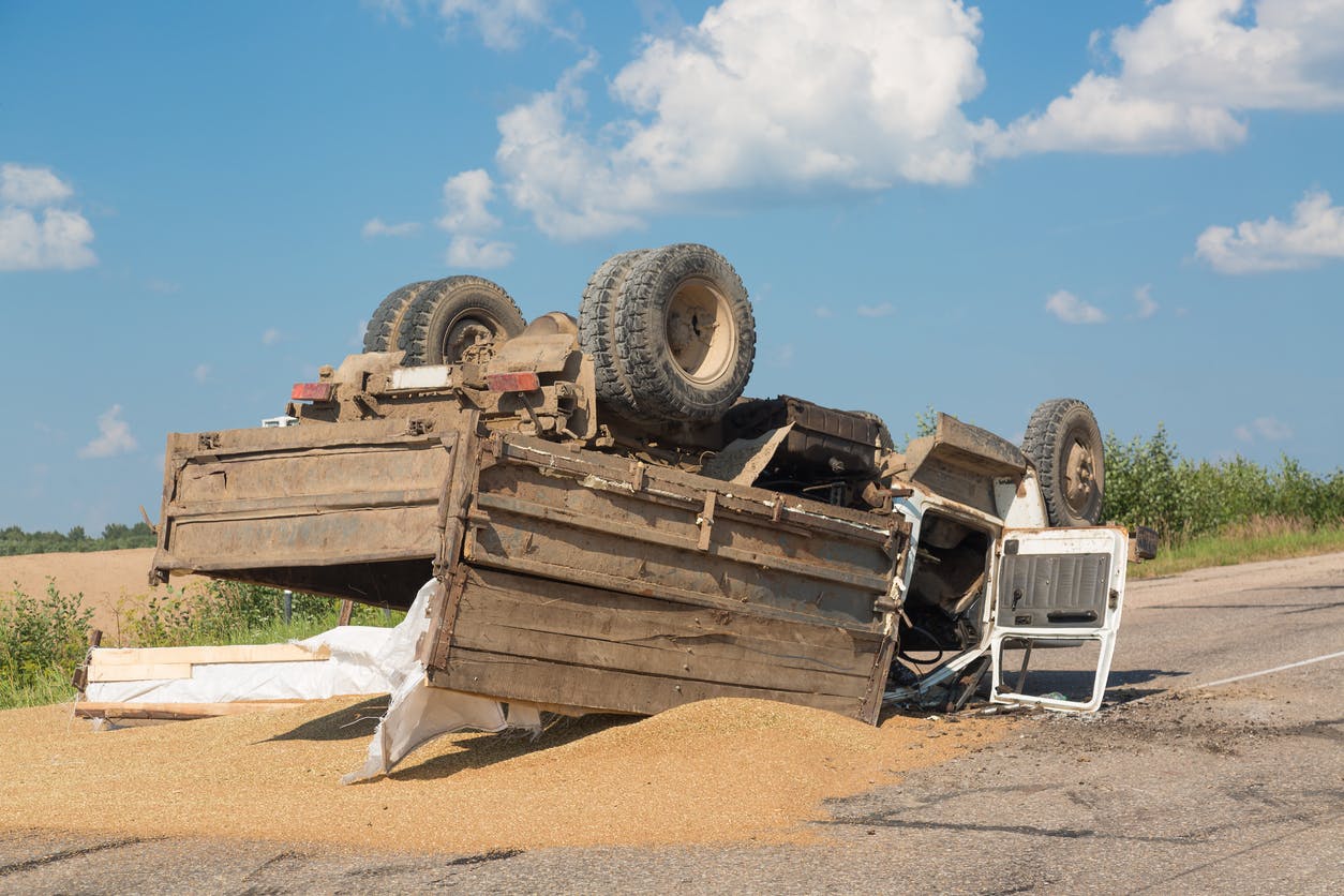 A rolled over dump truck