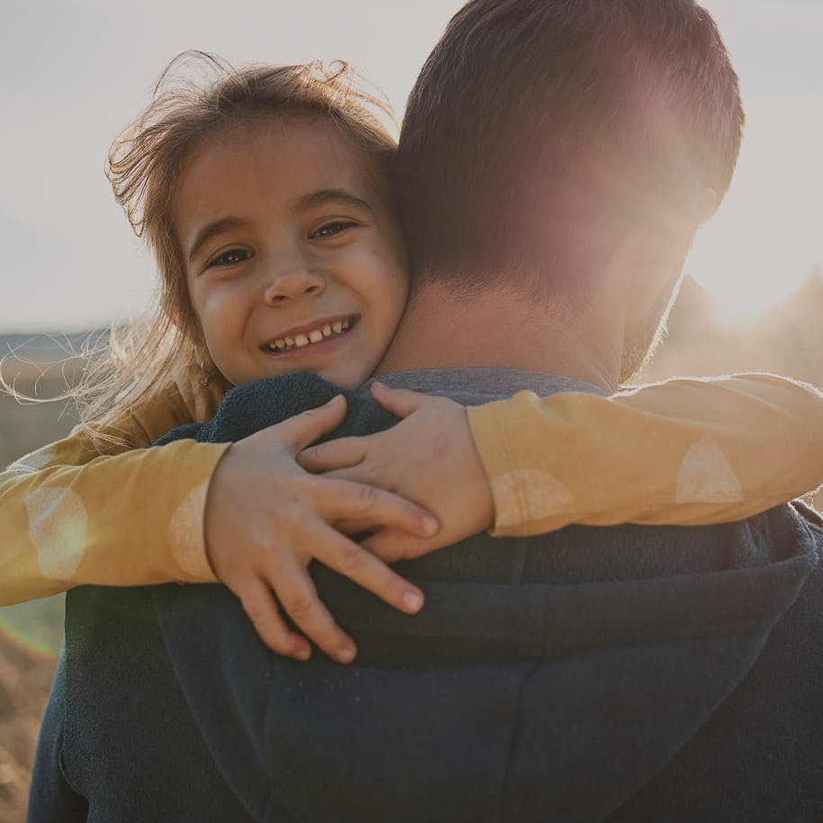 girl hugging dad