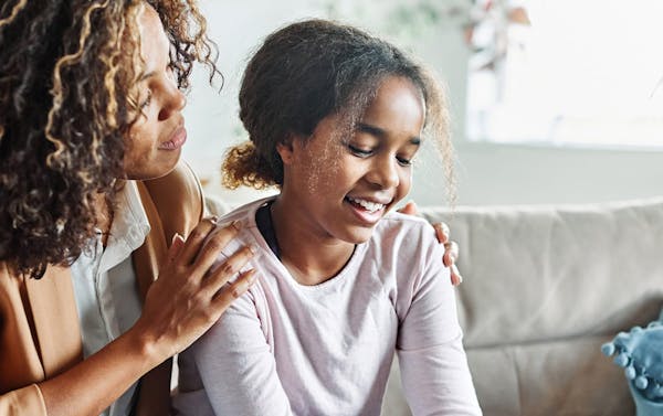 woman holding daughter