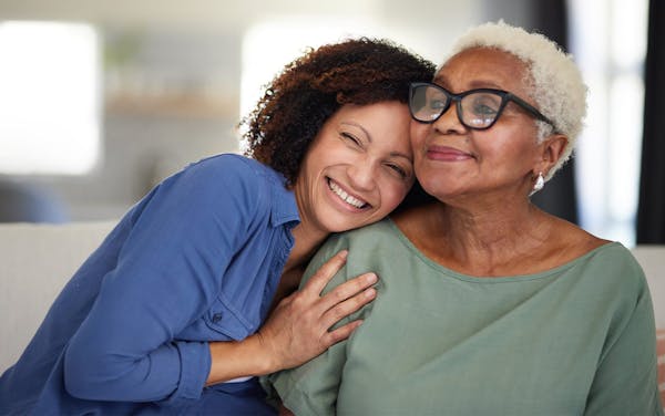 daughter hugging mother