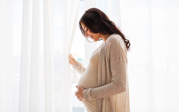 pregnant woman smiling