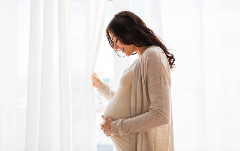 pregnant woman smiling