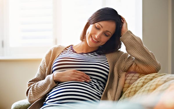 pregnant woman smiling