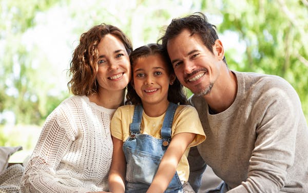 mother and father with daughter