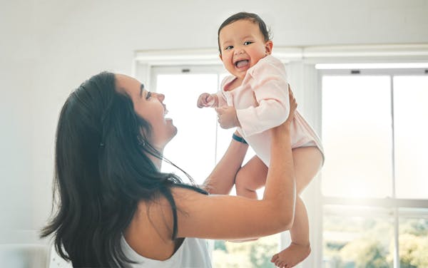 woman holding daughter