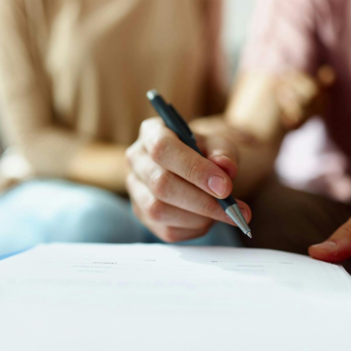 pen signing paperwork