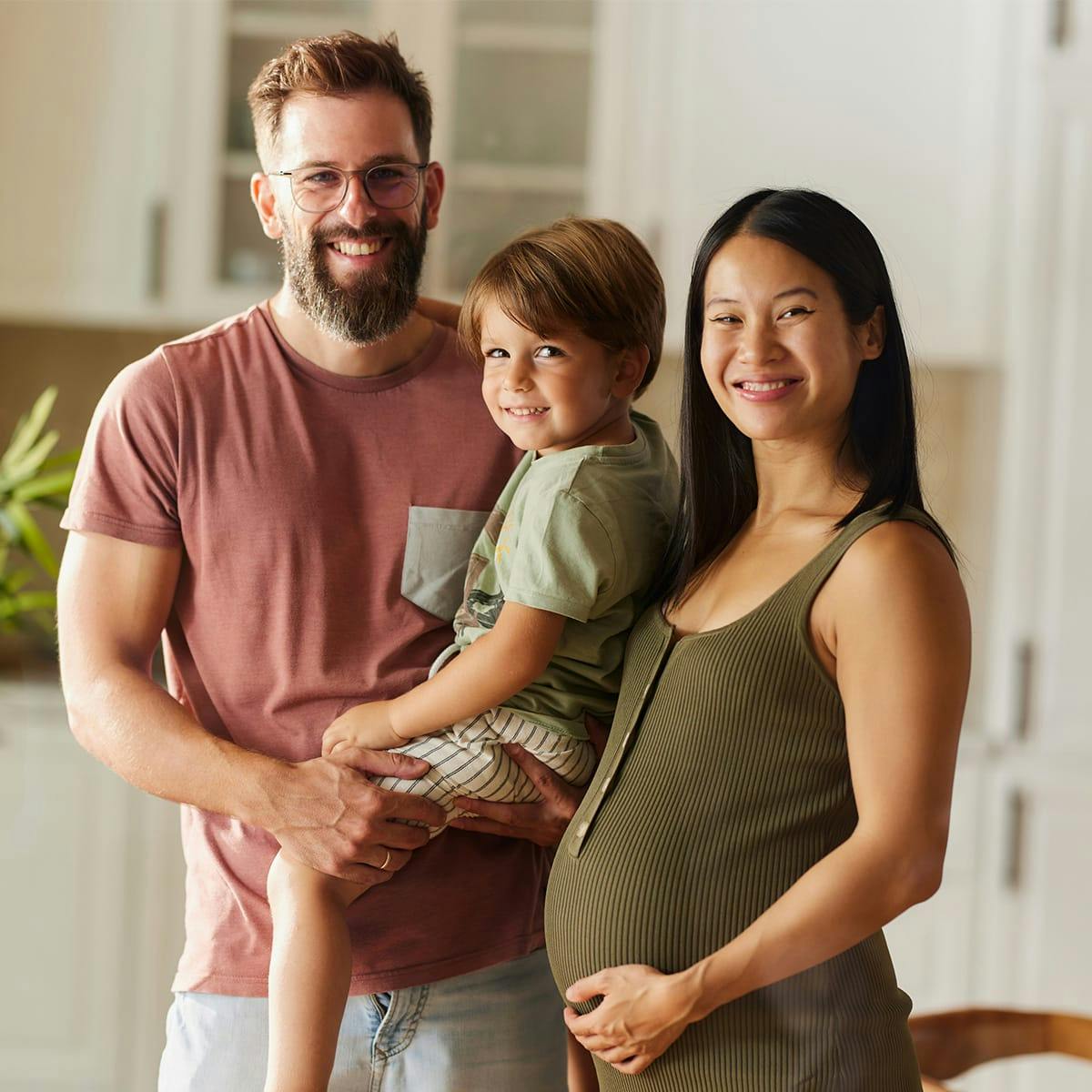father and mother with son
