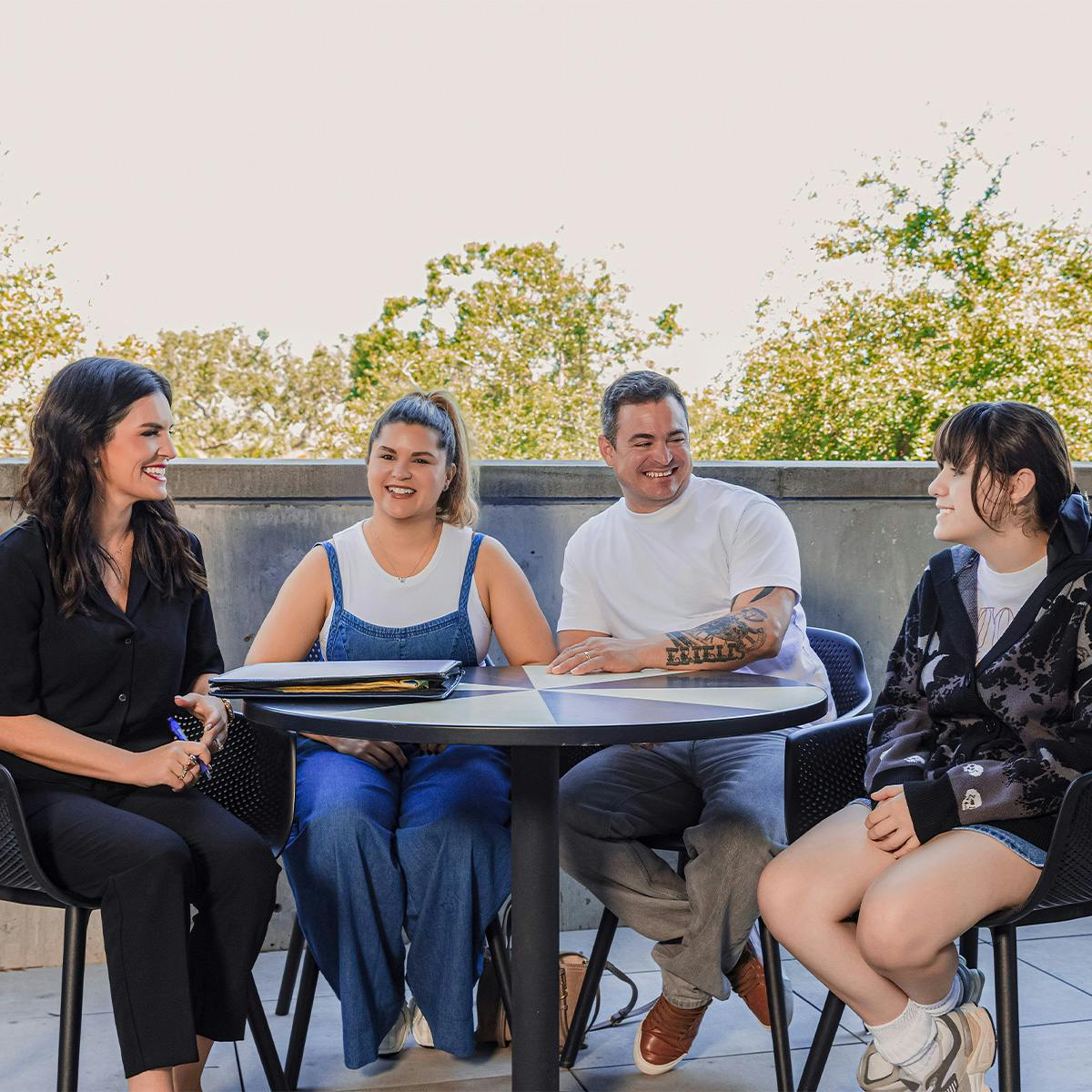 group of people sitting at table