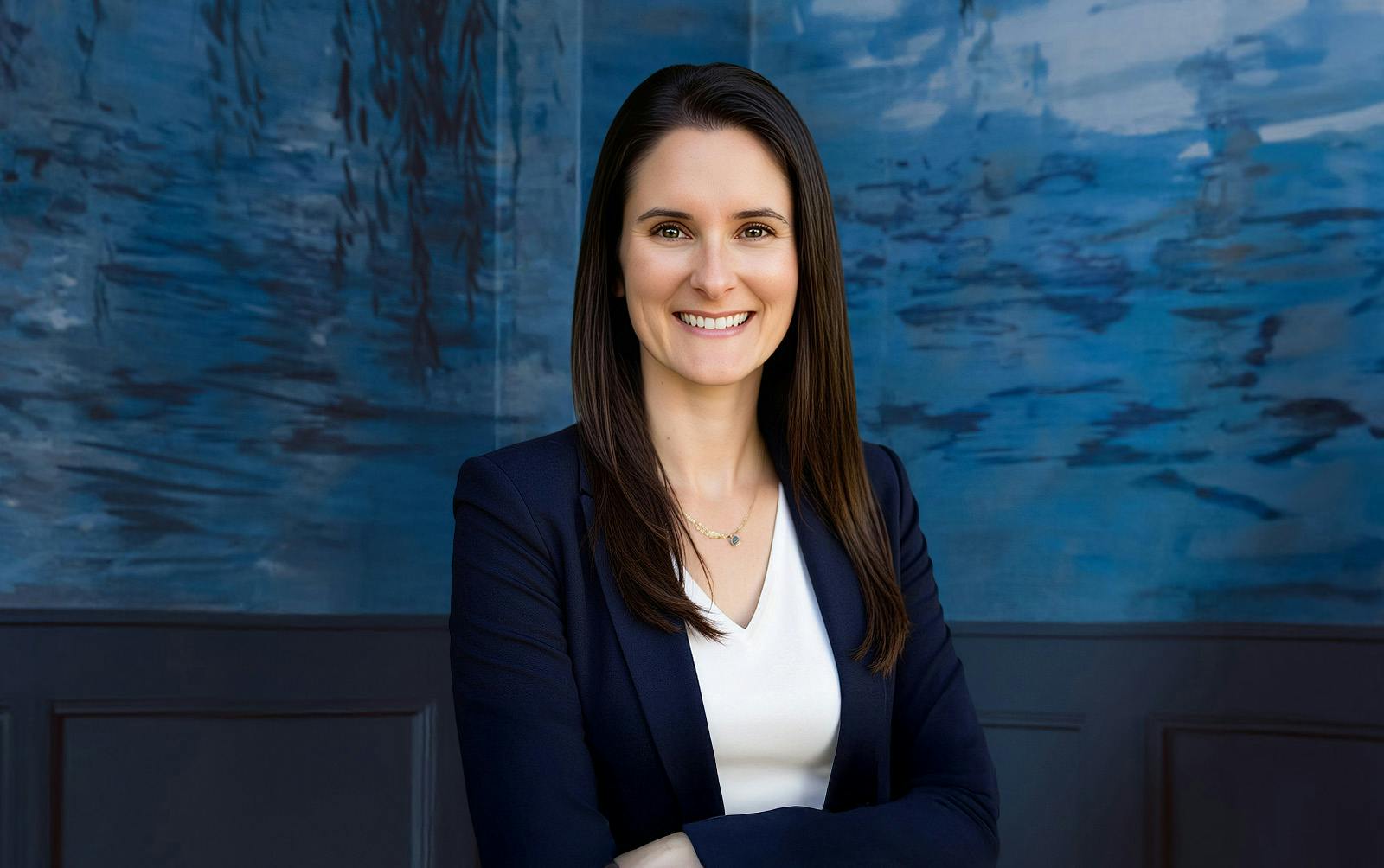 woman in blue suit smiling