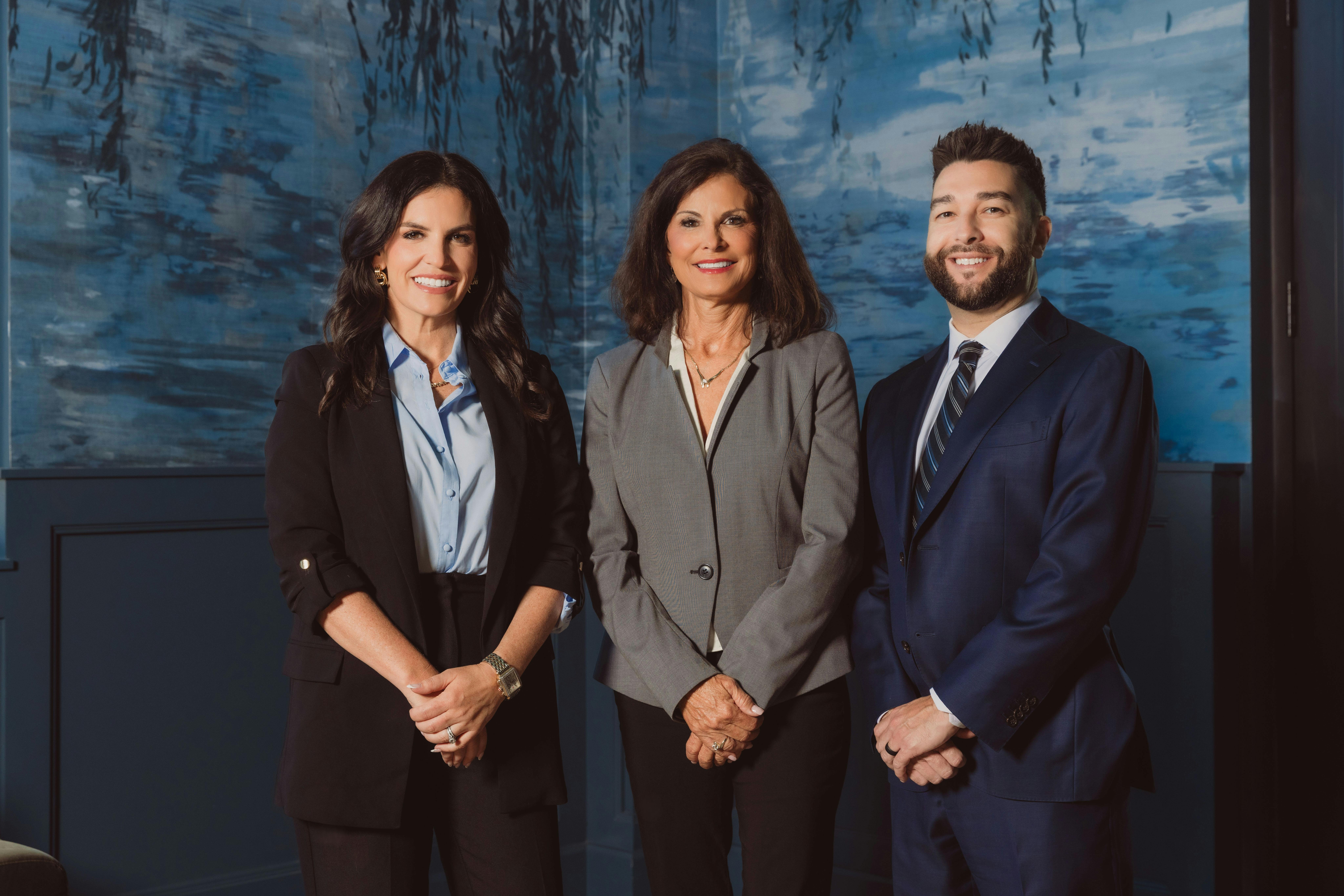Attorneys Jeanne T. Tate, Erica T. Healey, and Robert L. Webster