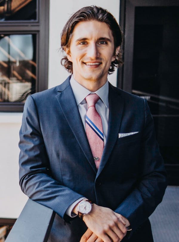 Dr. Lucas Bryant in a suit