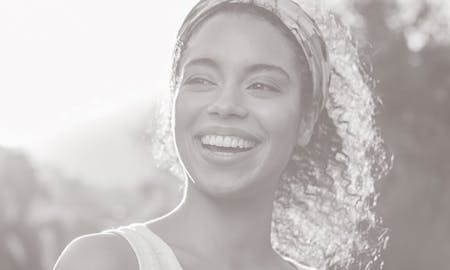 Woman smiling in the sun.