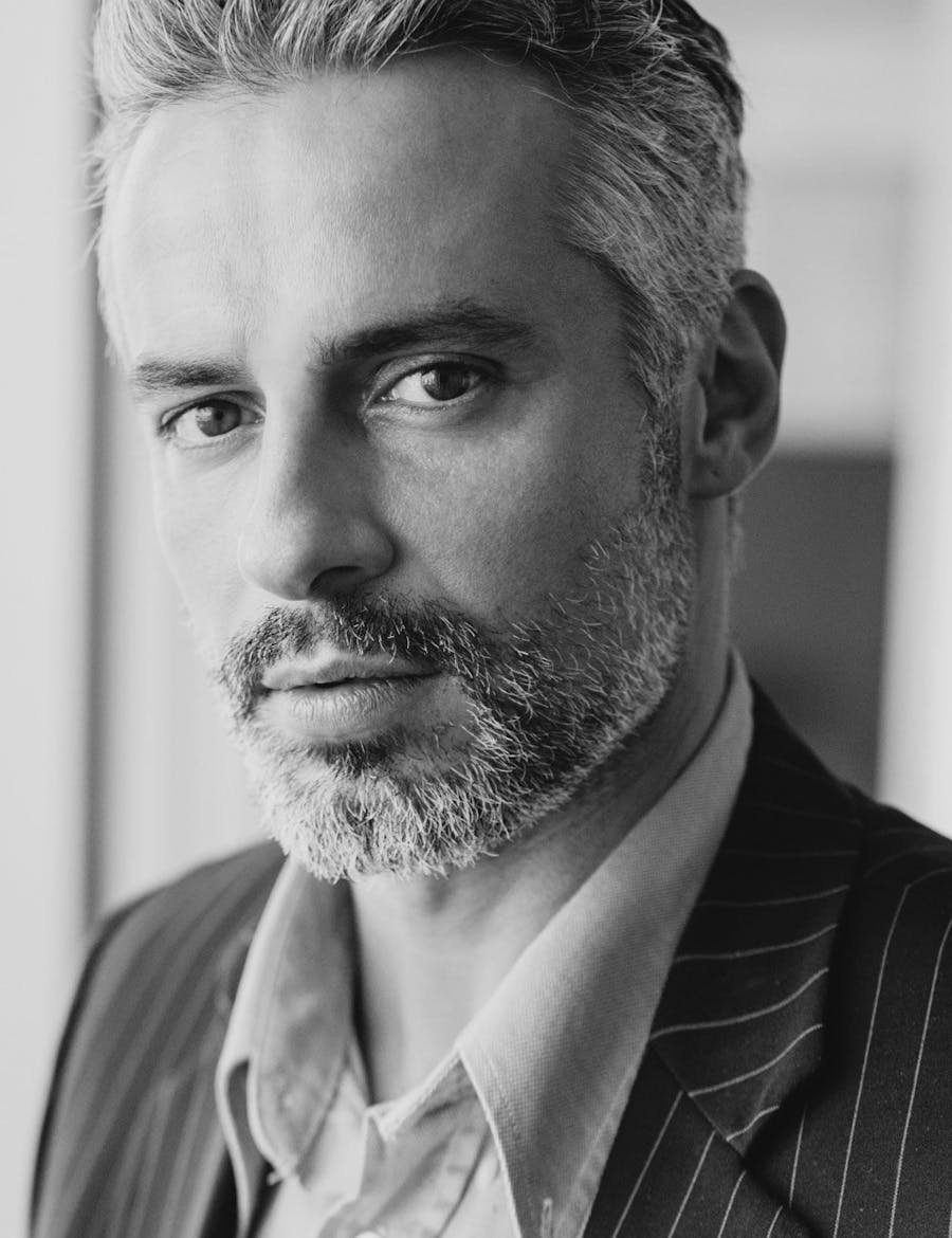 Handsome man with salt and pepper hair and beard