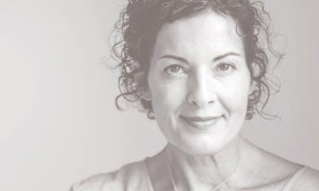 Middle aged woman with curly hair