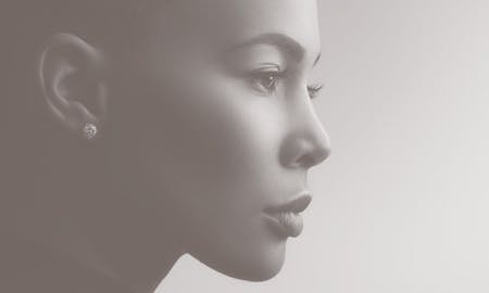 A woman in profile with very smooth skin