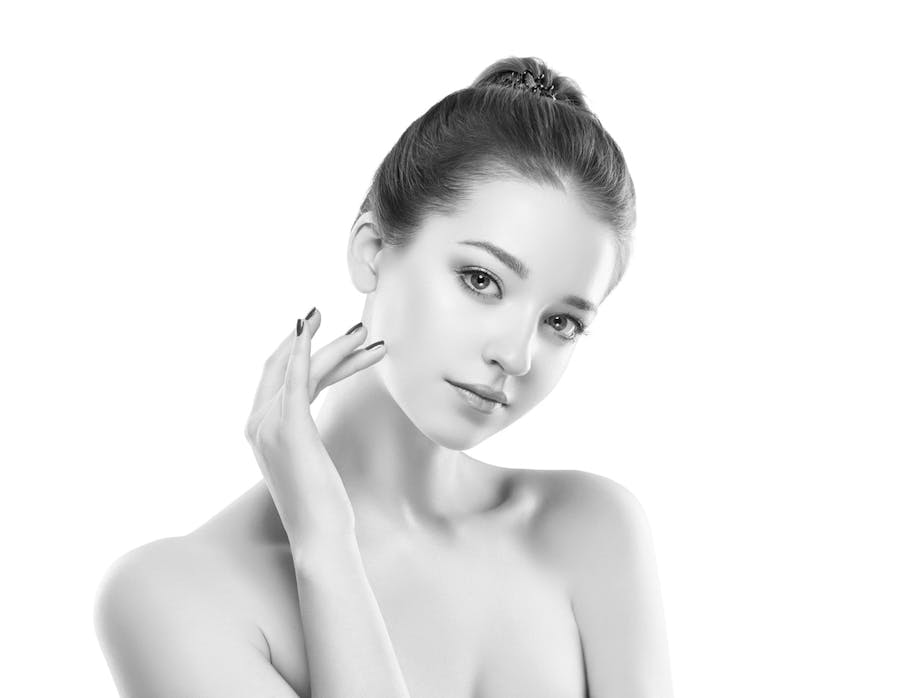 Woman with her hand on her cheek