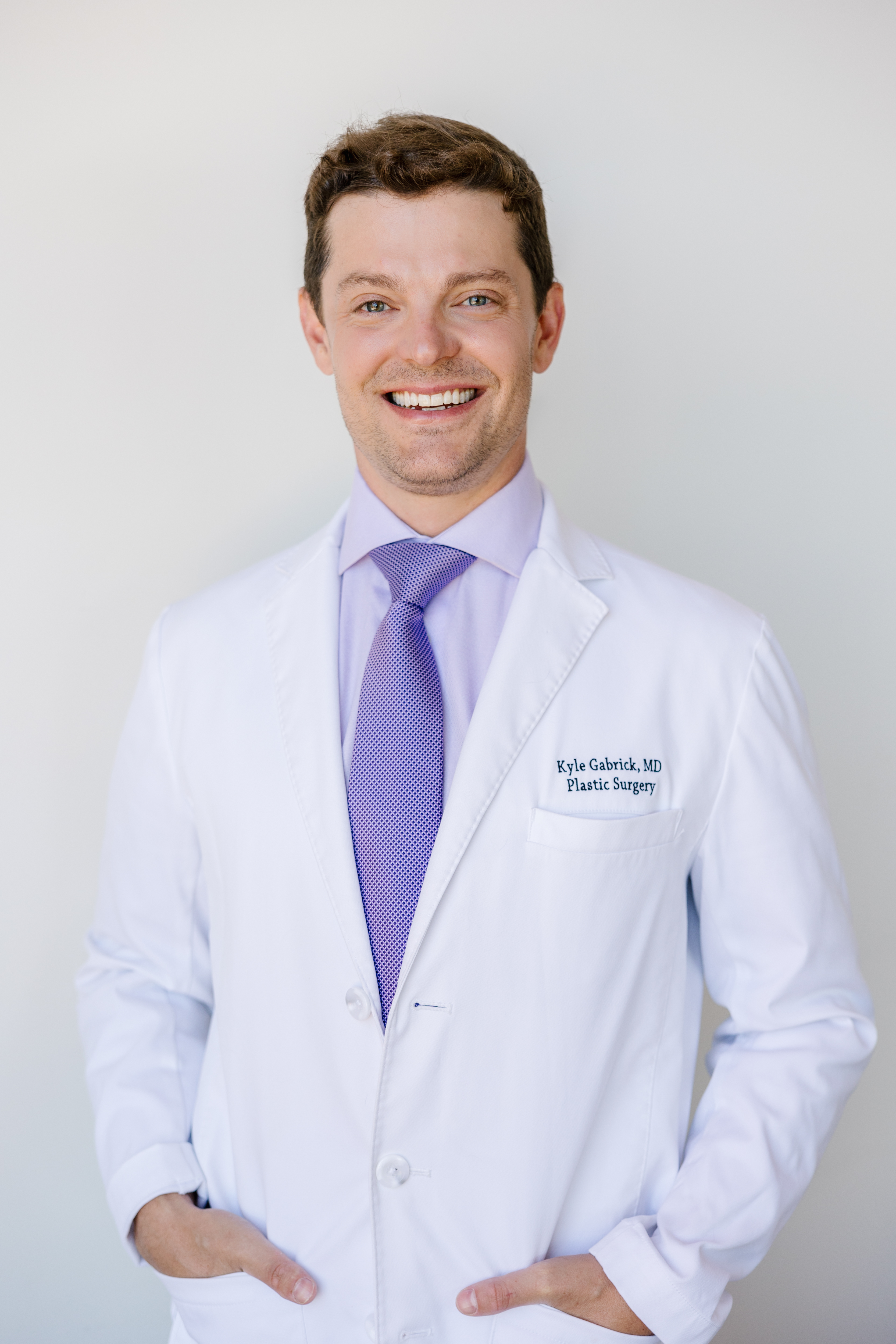 Dr. Kyle S. Gabrick, MD standing with his hands in his white coat