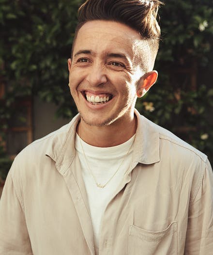 androgynous person smiling