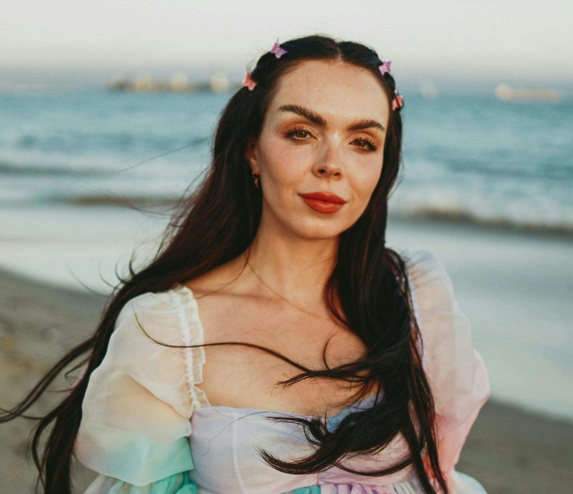 woman with butterfly clips in her hair