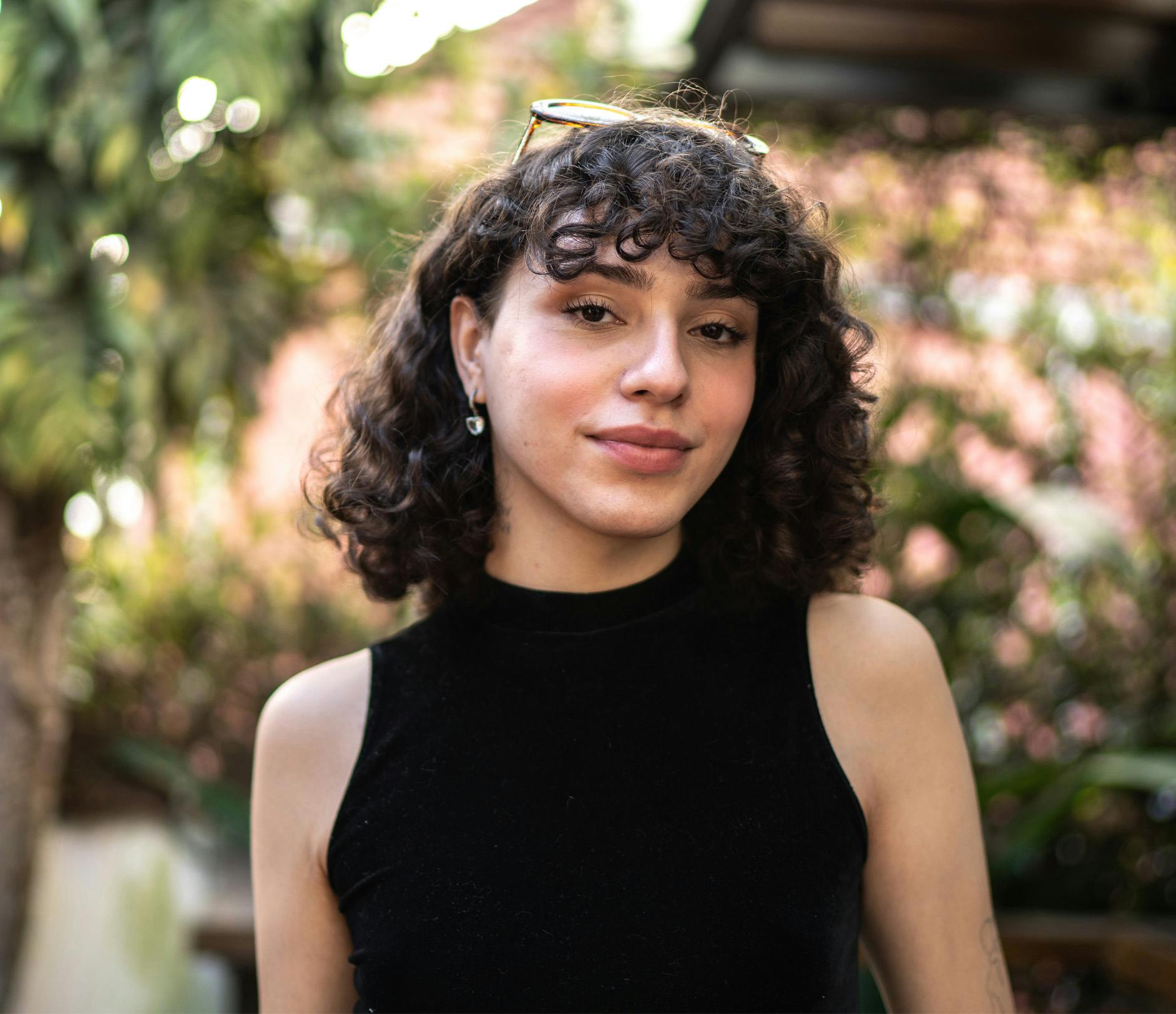 woman with dark curly hair