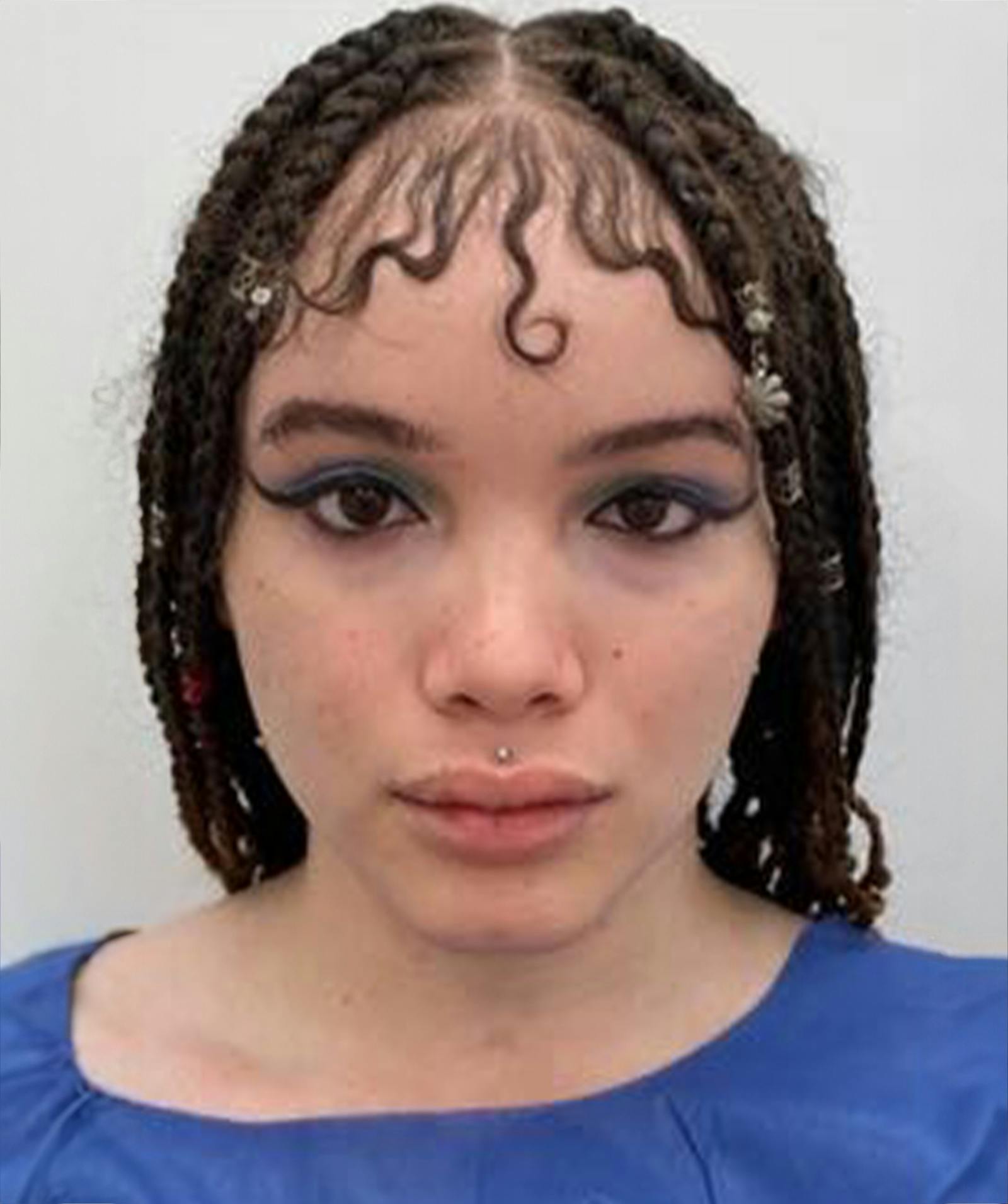 woman with dark braids
