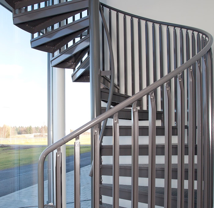 Powder coated spiral staircase with handrail on center tube and childsafe railing