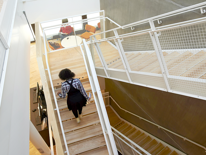 Straigt staircase with  wooden steps indoors