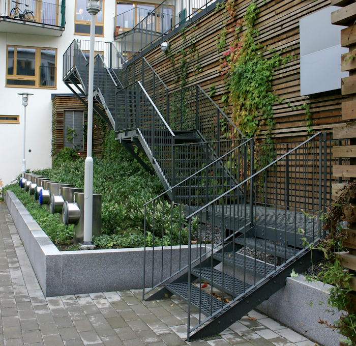 Powder coated straight staircase with grating steps