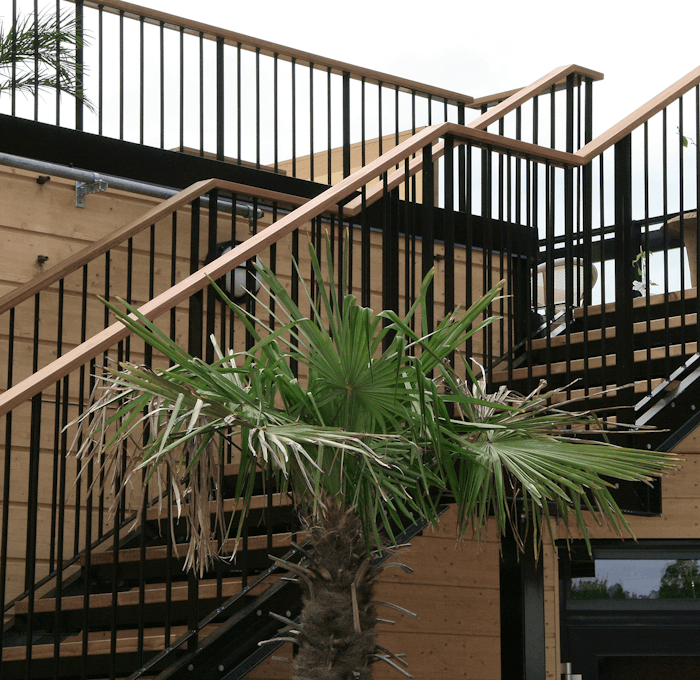 Powder coated straight staircase with wooden handrail and steps