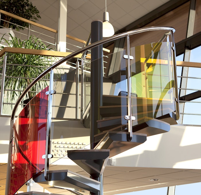 Exclusive indoor spiral staircase with glass railing