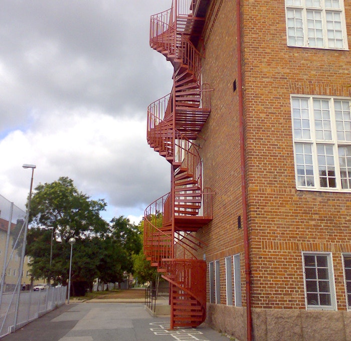 Powder coated spiral staircase with standard quarter cage