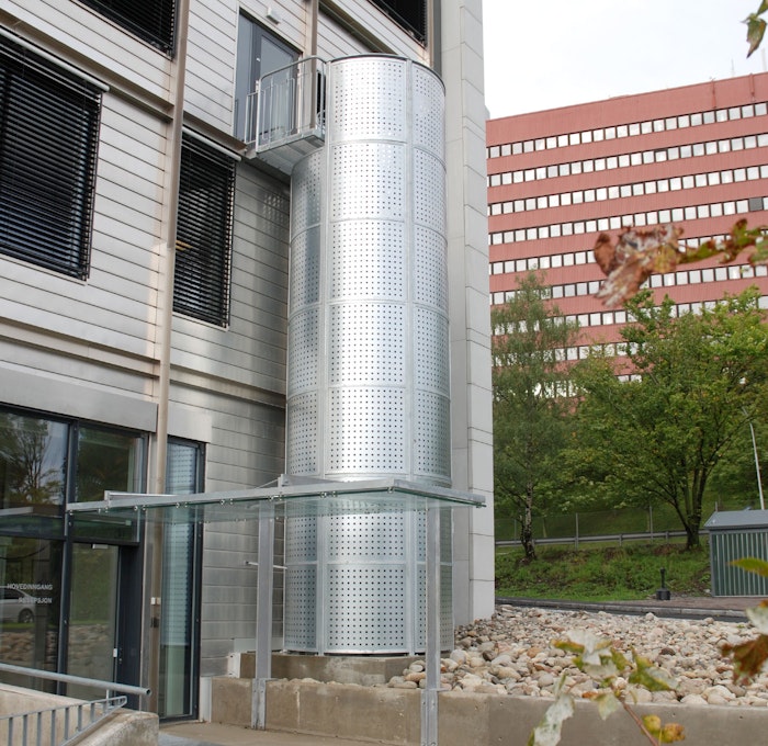 Spiral staircase with ground connected protective cage