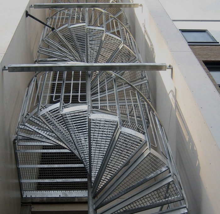 Spiral staircase with childsafe railing and press welded grating steps