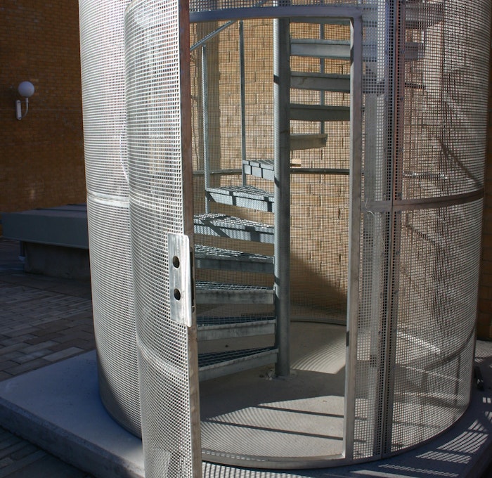Ground connected protective cage spiral staircase