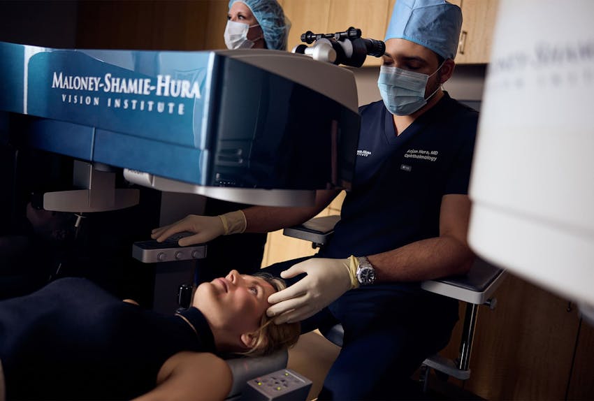 checking on patient's eyes