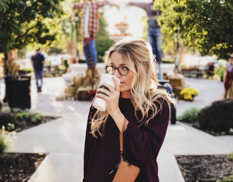 woman drinking coffee