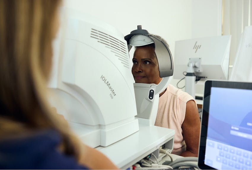 woman undergoing an eye exam