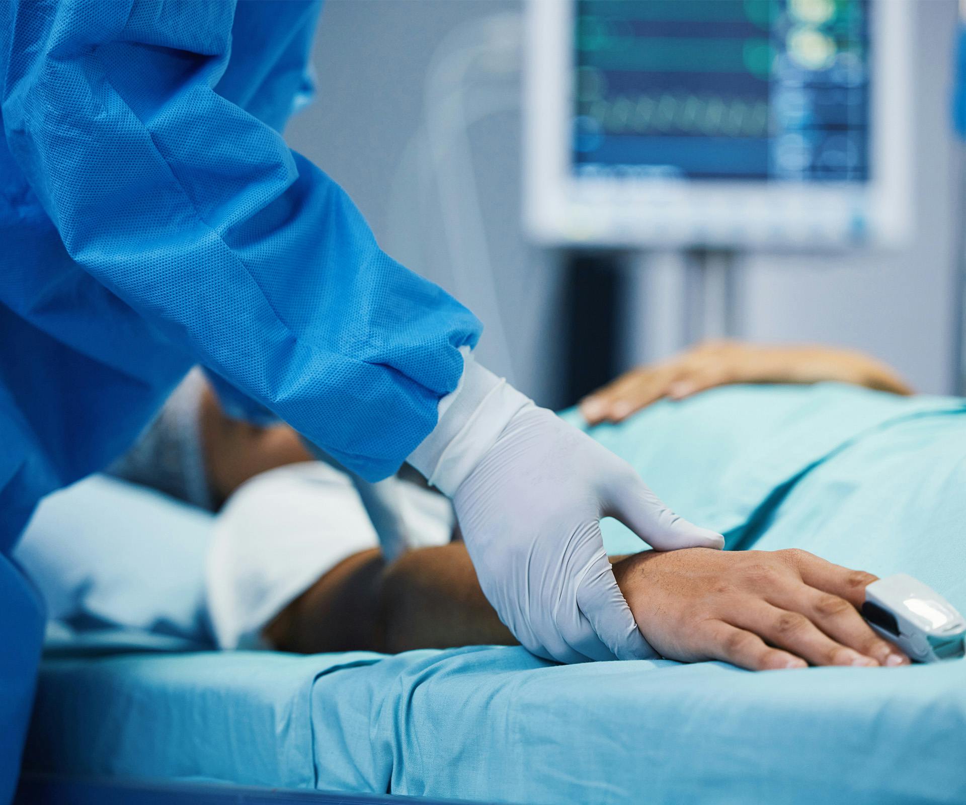 doctor holding patient's hand