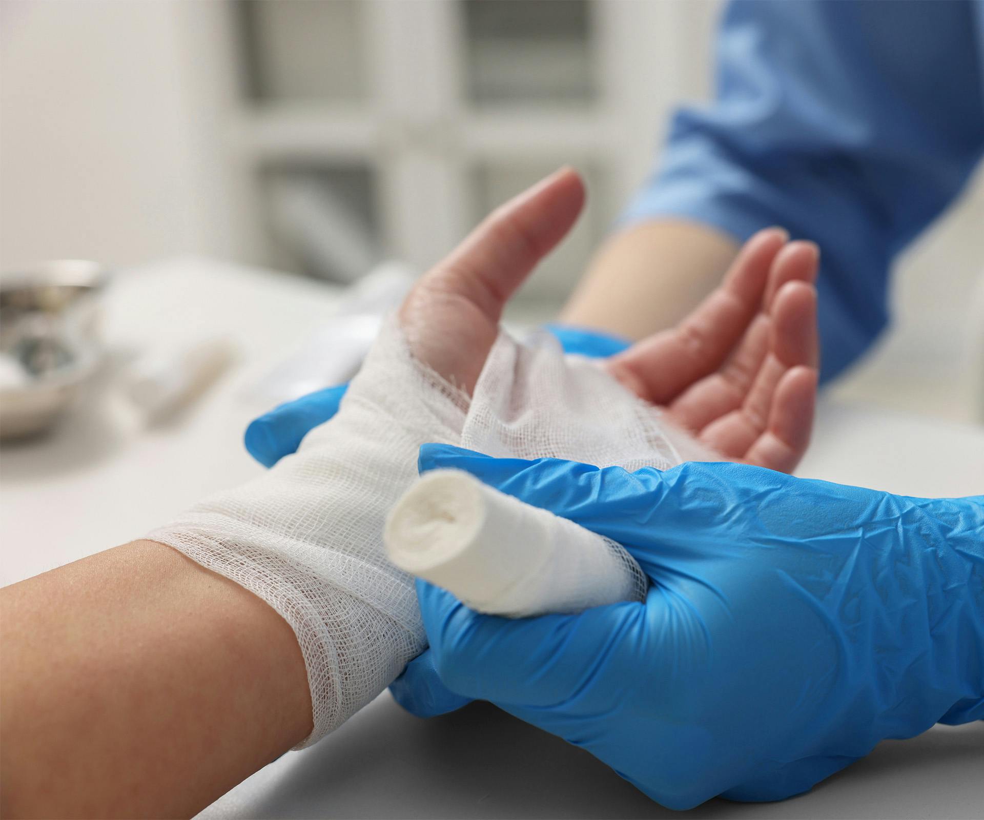 person getting a hand injury treated