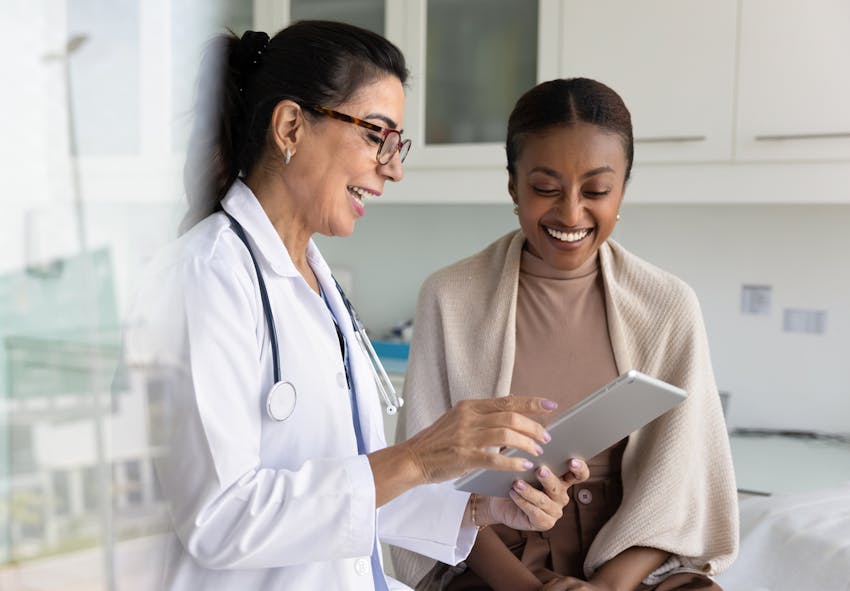 doctor speaking with patient