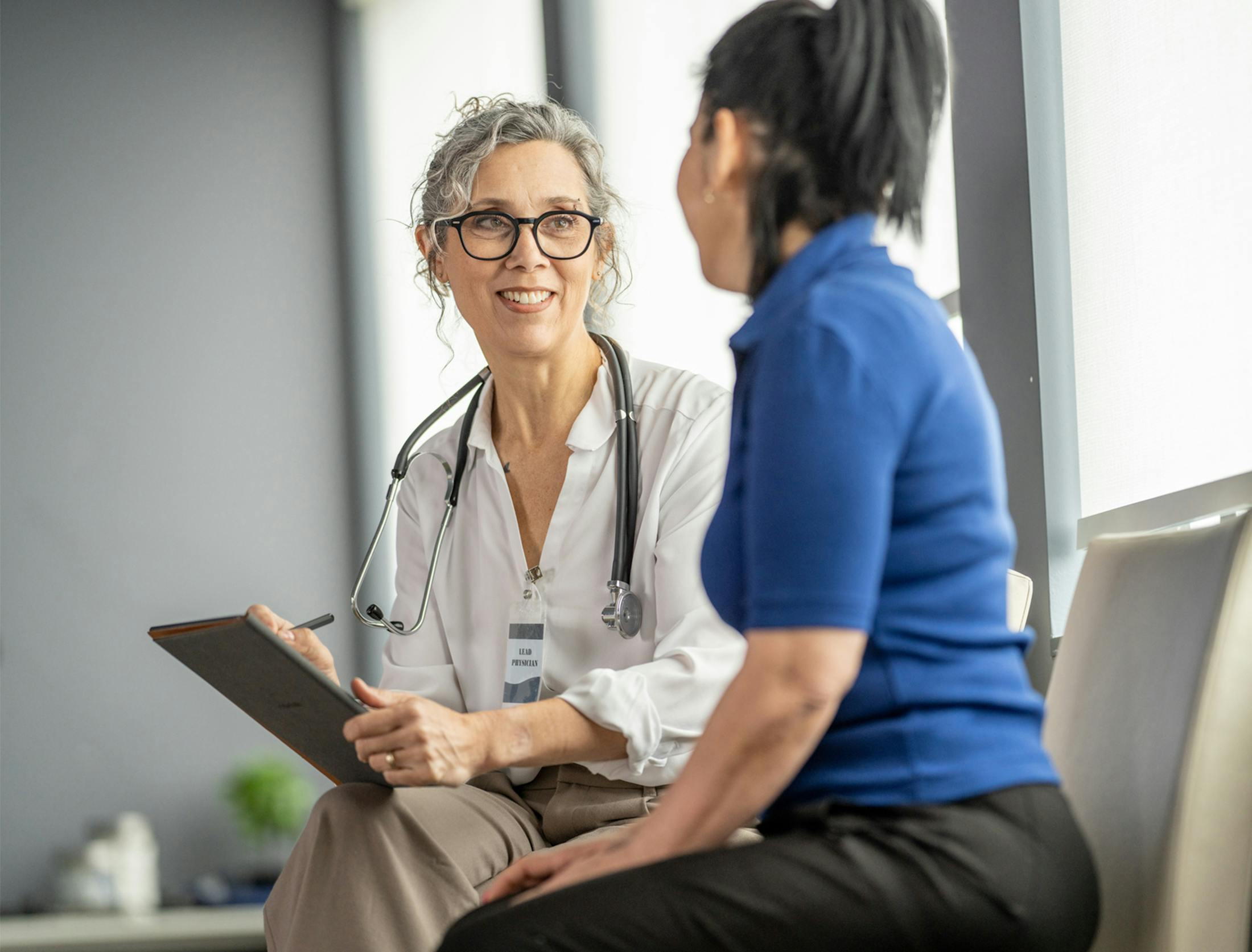 doctor talking to patient